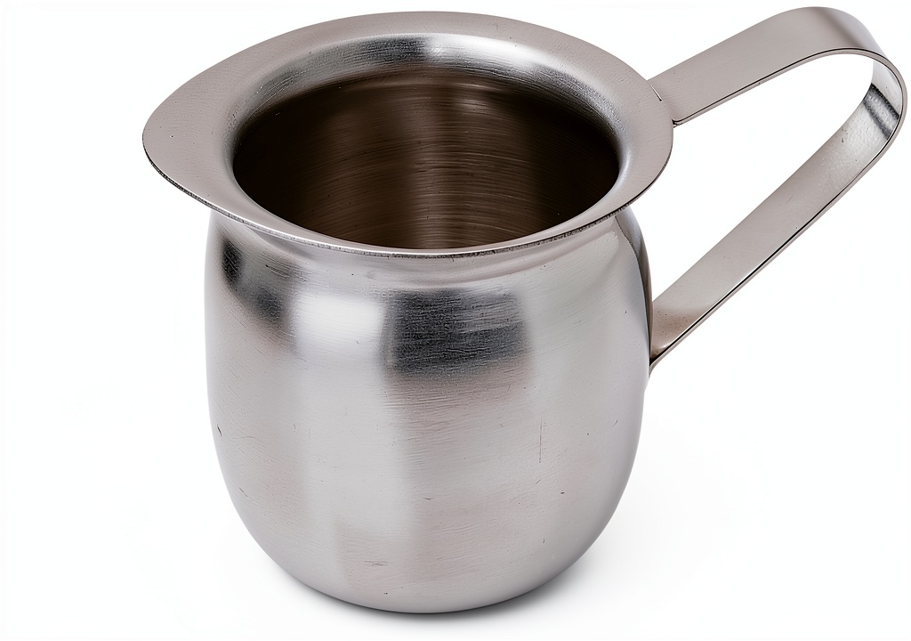 Winco Stainless Steel Bell Creamer on a kitchen counter
