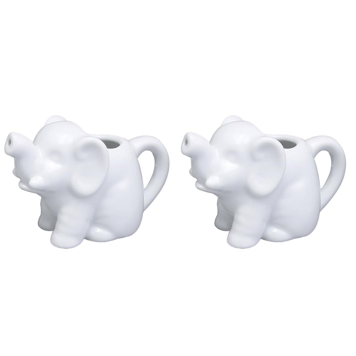 HIC Porcelain Mini Elephant Creamer set displayed on a wooden kitchen countertop